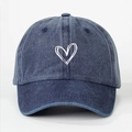 Vintage washed cotton baseball cap in denim blue with a white embroidered heart design - One Size / Navy Blue