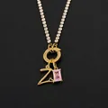 14K gold plated titanium steel necklace featuring letter Z and pink rhinestone charms - Letter Z