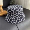 Close-up of navy blue cotton fisherman hat with white circular lace embroidery details - M (56-58cm) / Navy Blue Bucket Hat