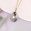 Detailed shot of drop-shaped natural stone pendant on a gold stainless steel chain - Grey-white Spotted Sun (8#)