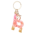 Pink resin letter R keychain with gold foil flakes and matching pink tassel accessory - Pink Gold Foil R
