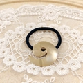 Minimalist black elastic ponytail holder with spiral golden metal ornament decoration - Gold Swirl
