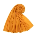 Solid ginger yellow jersey scarf with elegant rose-shaped fold and overlock edges - Ginger Yellow