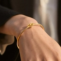 Minimalist 18K gold plated titanium steel knot C-shape cuff bracelet for women - Gold