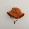 Detail of orange quick-dry sun hat featuring Lucky smiley face embroidery and chin strap - Lucky Smiley / Caramel color