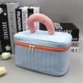 Light blue quilted makeup bag with pink cotton handle and orange dual zippers - Large / Blue
