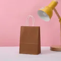Classic brown kraft paper gift bag with white handle for shopping and business branding - Coffee / 33*26*12