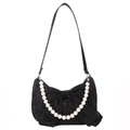 Elegante borsa a tracolla in pizzo nero con fiocco in raso e manico di perle grandi - Nero