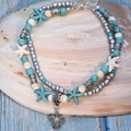 Cavigliera boho a doppio strato con perline turchesi, ciondoli a stella e tartaruga d'argento - Tartaruga