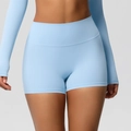 Dettaglio dei pantaloncini da yoga azzurri a vita alta con trama in tessuto spazzolato - S / Celeste