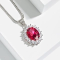 Collier en argent avec pendentif rubis ovale et entourage de saphirs blancs - Collier Rubis Or Blanc
