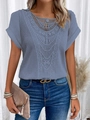 Detailed view of misty blue crochet short sleeve top with intricate hollow knit patterns - Blue