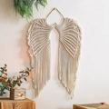 Handwoven bohemian macrame wall hanging in cream cotton with angel wing fringe design - Angel Wings