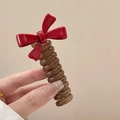 Brown spiral hair tie with a red bow and gold France Handmade text detail - Wine Red [Candy Bow]