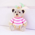 Sparkly rhinestone bear keychain in pink striped shirt on a gift box background - Pink Striped