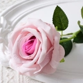 Pink velvet artificial rose flower with realistic green leaves and stem in close-up view - 10cm / Large Velvet Pink