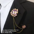 Detail of baroque brooch set with purple crystal and gold chains on a black suit - Purple Gem Style (TL24022)