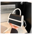 Contrast leather handbag in black and white with gold hardware and top handle - Black