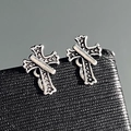 Cross earrings in antique silver finish with embossed details on a black texture base - Antique Silver Industrial Stud Cross