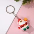 Cartoon Santa Claus PVC keychain holding a yellow star with a silver metal ring - Silver Ring Star Catching Santa
