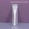 White dual-ended silicone face mask brush with polygon head and PVC storage pouch - PVC Frosted Bag / Polygon