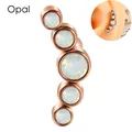 Rose gold curved ear crawler with five graduated white opals on a silicone ear model - Rose Gold - Opal Curved