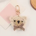 Handmade beige crochet bear head keychain with a dark brown plaid bow and gold clasp - Beige Style (Q1080-2)