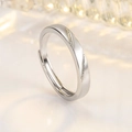 Minimalist silver couple ring with parallel diagonal grooves and shiny textured interior - Male Style