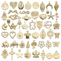 Assortimento di ciondoli dorati con motivi a cuore, albero della vita e celesti - Nuovo KC Oro 50 Stili