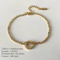 Gold plated stainless steel rolo chain bracelet with 10mm round pendant detail - Polished Circle Pendant Rolo Chain (XBL0023-2)