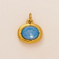Gold stainless steel pendant with oval blue faceted zircon birthstone on textured surface - March Oval Birthstone Pendant Only (Without Chain)