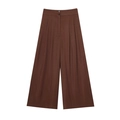 Detail of high-waisted brown wide-leg trousers with textured fabric and double-button closure - Brown Wide-leg Pants