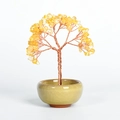 Handcrafted yellow crystal money tree with golden wire in a light green ceramic bowl - Citrine