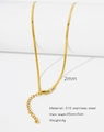 Detailed view of a 2mm gold-plated 316L stainless steel snake chain on a white stand - HC0038G-Blade Chain