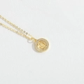 Gold Virgin Mary round pendant necklace with sparkling crystal halo on white leather - Gold Hollow Virgin Mary Medal