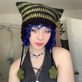 Knitted cat ear hat featuring black and grass green stripes with woven tassels - Adult 56-59cm / Green+Black