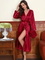 Detailed view of the elegant dark red satin robe with silk texture and matching waist tie - S / Red