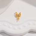 Detailed view of a golden butterfly pendant base with inlaid purple zircon for DIY jewelry - Style I / Gold