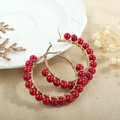 Handmade stainless steel gold hoop earrings featuring deep red shell pearl bead wrapping - Dark Red
