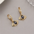 Macro shot of 14K gold plated evil eye drop earrings with blue marquise stone and white zircons - H-8672 Evil Eye