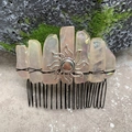 Detailed view of bohemian crystal hair comb with black wire wrap and silver sun charm - Electroplated Rose Quartz Black Wire Silver Sun
