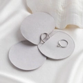 Microfiber envelope jewelry pouch in light gray with two silver rings inside - Gray