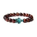 Elastic beaded bracelet featuring tiger eye stones and a green turquoise turtle charm - Red Tiger Eye