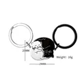 Close-up of black and white cat couple keychains with 16g weight and 25x29mm size - Black and White Cat Keychain Pair