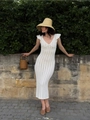 Close-up of white crochet knit dress showing intricate hollow out patterns and V-neck - S / Yellow