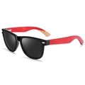 Classic oval polarized sunglasses with glossy black frame and red wood grain temples - Red Skateboard Wood Temple Polarized Full Grey Lens