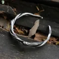 Vintage geoxideerd zilveren Mobius armband met getextureerd ontwerp van een wijnstok - Drijfhout