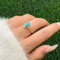 Detailed shot of handmade gold wire-wrapped ring with an irregular turquoise stone - 02 Gold + Blue (Irregular Stone)