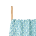Muslin baby swaddle blanket featuring blue rainbow arch patterns on a wooden stand - Blue Arches (S142)