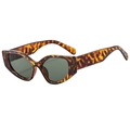 Occhiali da sole cat-eye con montatura tartarugata e lenti verde scuro per uno stile di moda - Tartarugato